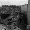 Excavation photograph : section in relation to section looking north.