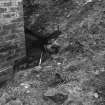 Excavation photograph : detail of wall (12) looking west.