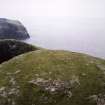 General oblique aerial view of the S side of Guarsay Mór, taken from the NNE.