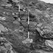 Excavation photograph : outer defences on south side with double outer revetment exposed.