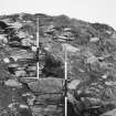 Excavation photograph : outer defences on south side with double outer revetment exposed.