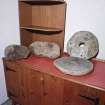 Muck, Port Mor. Rotary quern and fragments of two saddle querns (including that from NM48SW 12).