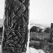 Detail of 'harpist' panel and of interlace on N side of cross-shaft.