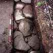 Detail of paving at N end of the excavation trench. Scale in 200mm divisions