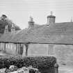 View of Kirk Wynd cottages, Glamis, from SW.