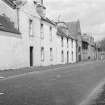 View from south of Old Schoolmaster's House and house adjoining Stewart's, Inveraray.
