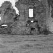 View inside north side of angle of tower showing window openings and blocked up doorway, Kilbirnie Castle.