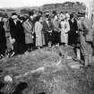 Excavation photograph : L M Mann explaining site to visitors, 7 November 1937.