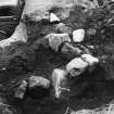 Excavation photograph. 'Bronze Age Burial: Looking into grave from the north.' July 1937.
