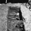 Excavation photograph - skeleton 1 pelvis exposed in trench 2, from N
