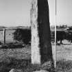 View of standing stone from S.