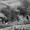 General view of caves, looking across sheep-pens from S.