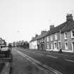 View from S, showing the Red Lion Hotel, High Street, Ayton, on the left.