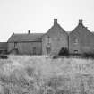 View of rear of all buildings from NW.