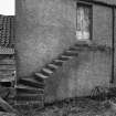 View of granary stair from NW.