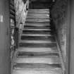 Interior.
Beer and wine store, view of staircase.