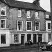 View of Butcher and Newsagent.