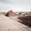 General view of boat house and ramp from WNW