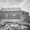 View from S of S side of boat house, showing brick lean-to extension