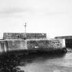 View of harbour mouth and harbour wall.