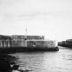 View of harbour mouth and harbour wall.