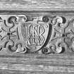 Interior.
Detail of carved panel and monogram.