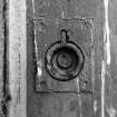 Detail of specimen door latch and handle.