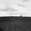 Distant view of both cairns.