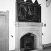 Chapel, interior view of fireplace with painting above.
