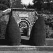 Arch leading to flower garden, view from South West.