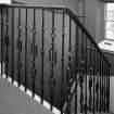 Interior. East staircase cast iron bannister