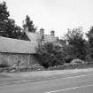 General view from SW showing mill, mill house and ruinous detached kiln.