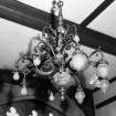 Interior.
Ground floor, hall, detail of chandelier.