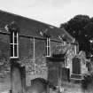 Close view of church and graveyard.