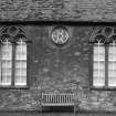 Detail of S windows showing circular window behind pulpit