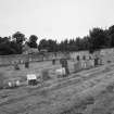 View of  graveyard in former manse walled garden from ENE