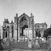 General view from E of presbytery and N and S transepts.