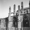 View from SE of S aisle, chapels and flying buttresses