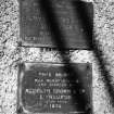 Detail of Redpath, Brown and Company plaques marking original construction in 1826 and restoration at their expense in 1928.