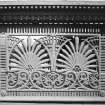 Detail of cornice and frieze of cast iron urinal.