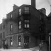 Copy of historic photograph showing view of Burgh Arms Public House.