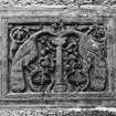 Detail of carved panel above main entrance doorway.
