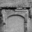Detail of head of blocked doorway and inscription dated 1571
