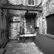 Detail of sluice in NW wing of main block.