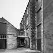 View from SW of sluice in NW wing of main block.