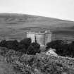 General view of Hermitage Castle from SW with Park Wall in background.