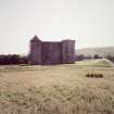 General view of Hermitage Castle and earthworks from N.