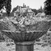 Detail of bowl of columnar garden urn.