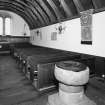 Interior. View of nave showing pews