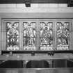 Interior. Chancel. Detail of 4-light glazing row with cusped detailing on S elevation